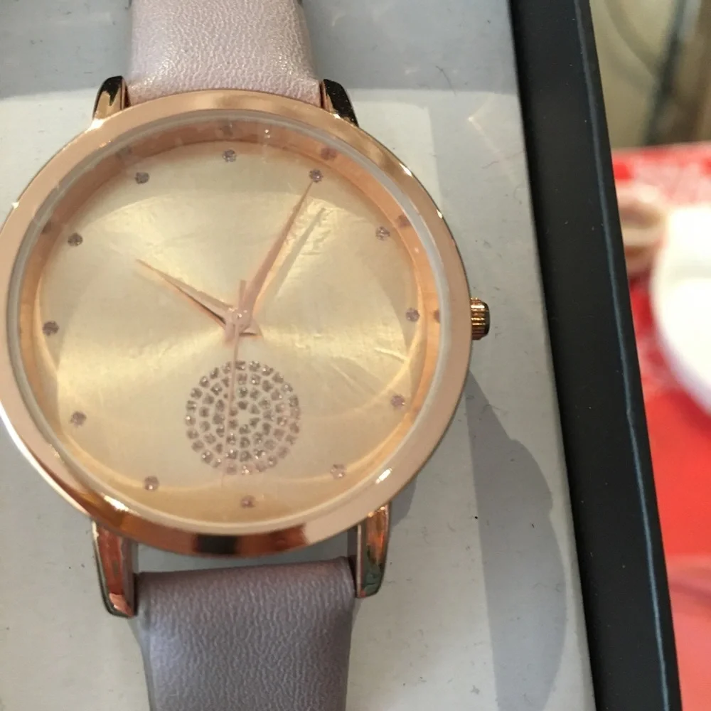 Watch Geneva light mauve band & gold face!